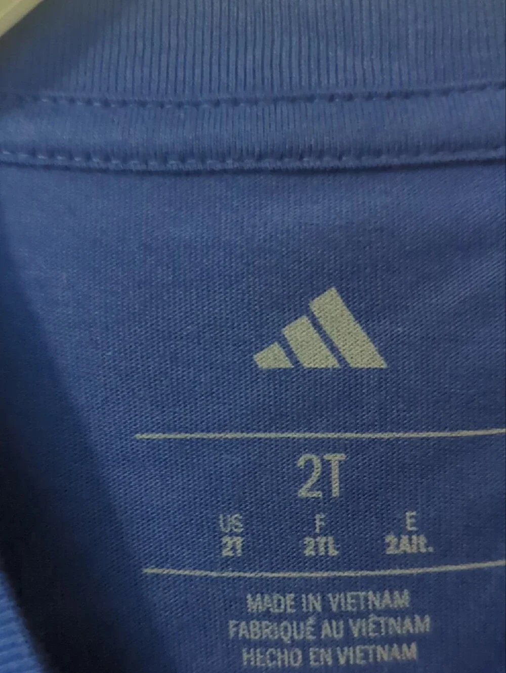 adidas Royal Blue Long-Sleeve Top with Neon Green Logo and Black Pants